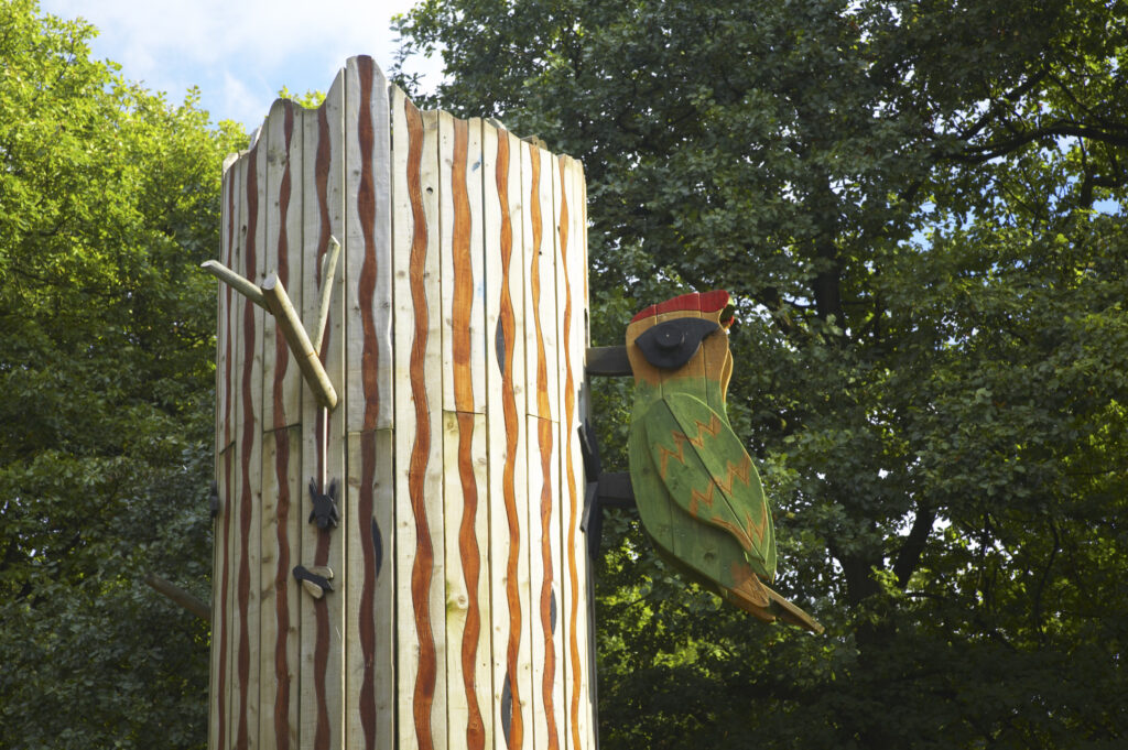 ENGLAND Worcestershire Wyre Forest Wooden wood pecker on a feature near the visitor centre.