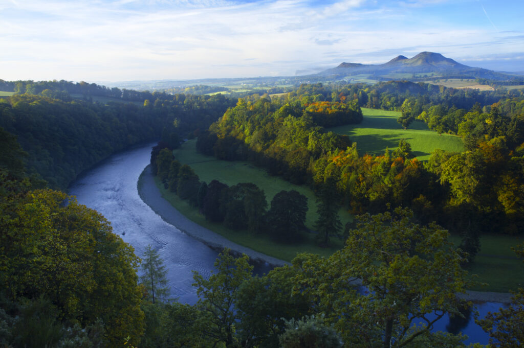 Scotland, Scottish Borders, Melrose. The Eildon Hills and the River Tweed, viewed in Autumn from the famous viewpoint of Scott's View near Newton St Boswells.