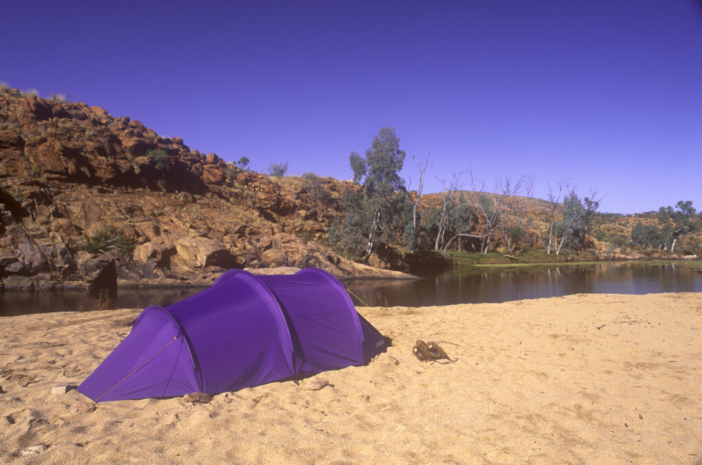 AUSTRALIA Northern Territory, West MacDonnell National Park. Wild Camping next to a Billabong in the outback