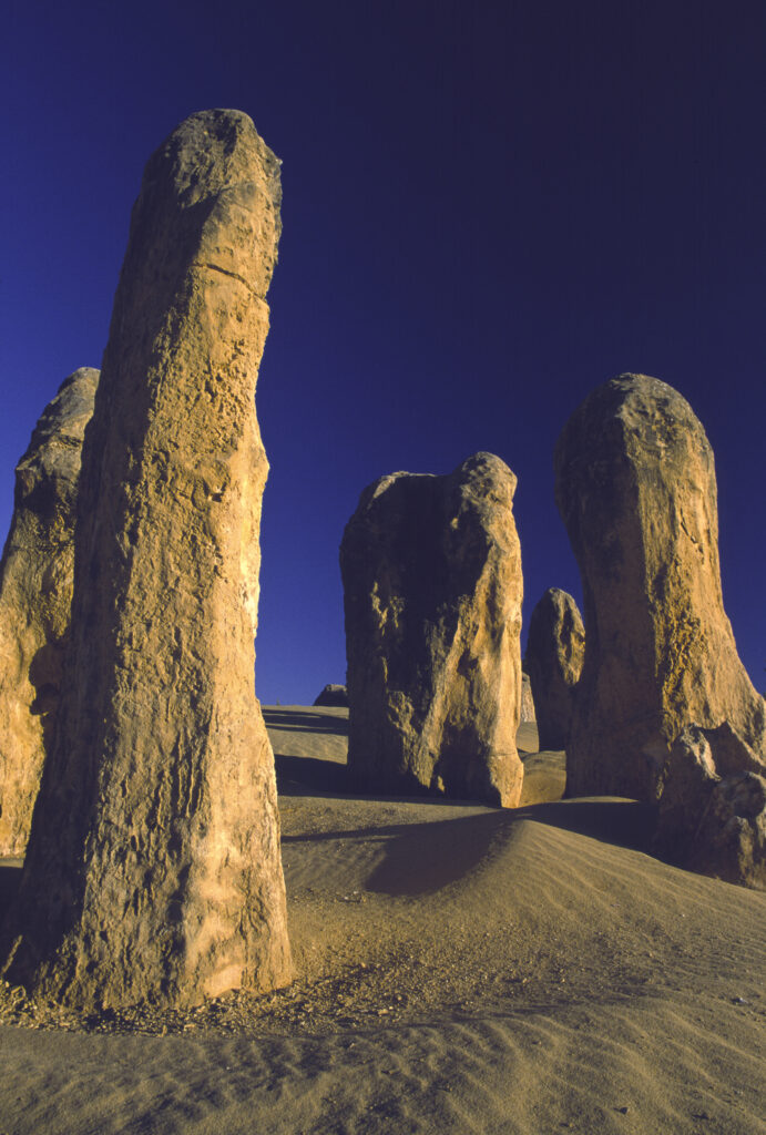 AUSTRALIA, Western Australia, Pinnacles. A small group of a selection of the hundreds of unusual limestone pillars found in Nambung National Park