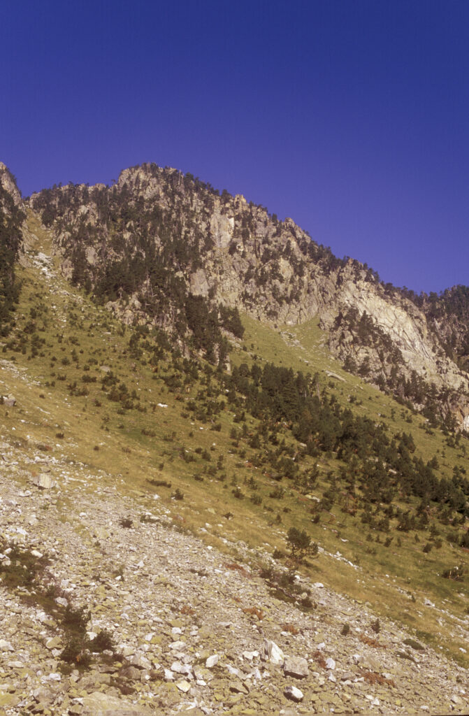 FRANCE, Midi Pyrenees, Pyrenees National Park. The scarred landscape of the mountains surrounding the Lac De Gaube