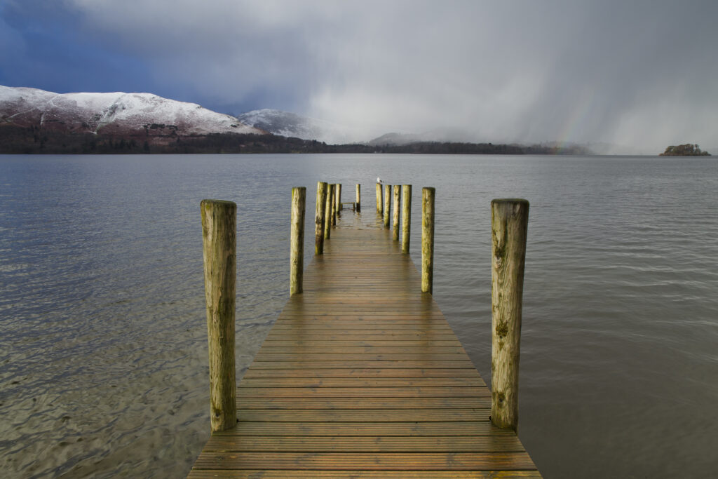 England, Cumbria, Lake District National Park. Winter storm on Derwentwater viewed from Ashness Jetty near the lakeland town of Keswick.
