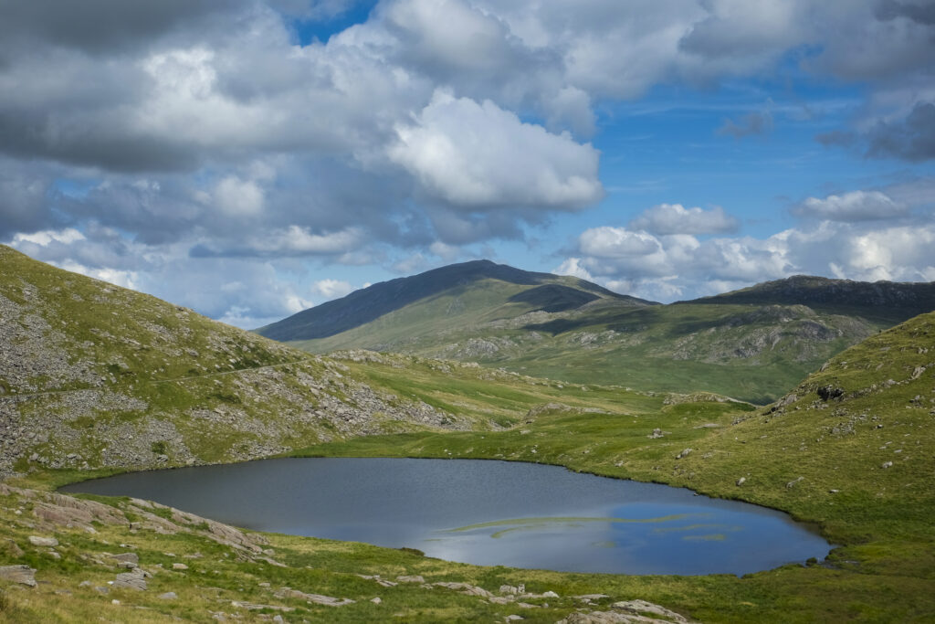 Wales, Gwynedd, Snowdonia National Park. Llyn Teyrn, a small lake near the Miners Track - A popular walking route to the summit of Snowdon.