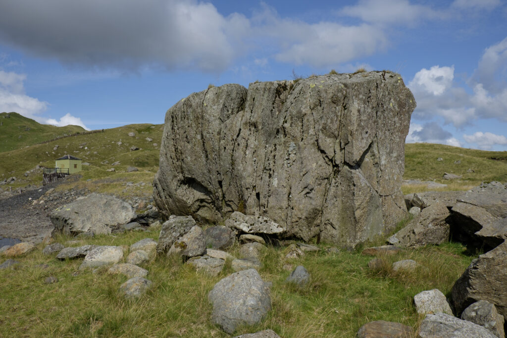 Wales, Gwynedd, Snowdonia National Park. Large rock boulders located on a plateau near the Miners Track - A popular walking route to the summit of Snowdon.