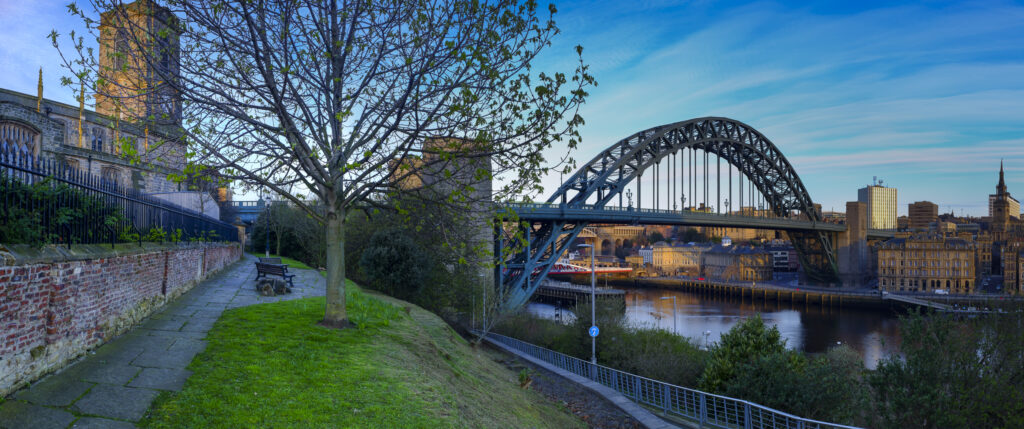 England, Tyne and Wear, Newcastlle Upon Tyne. Panoramic view from Gateshead looking towards the Newcastle Quayside and the Newcastle Tyne Bridge.