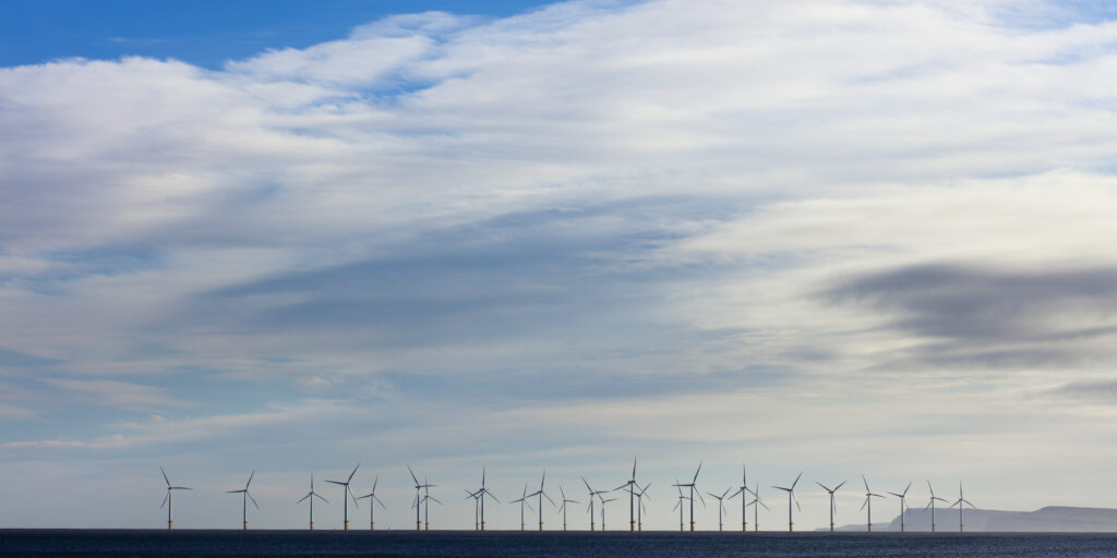 England, County Durham, Teesside Offshore Windfarm. The north sea situated wind turbines of the Teesside Offshore Windfarm viewd from Seaton Carew.