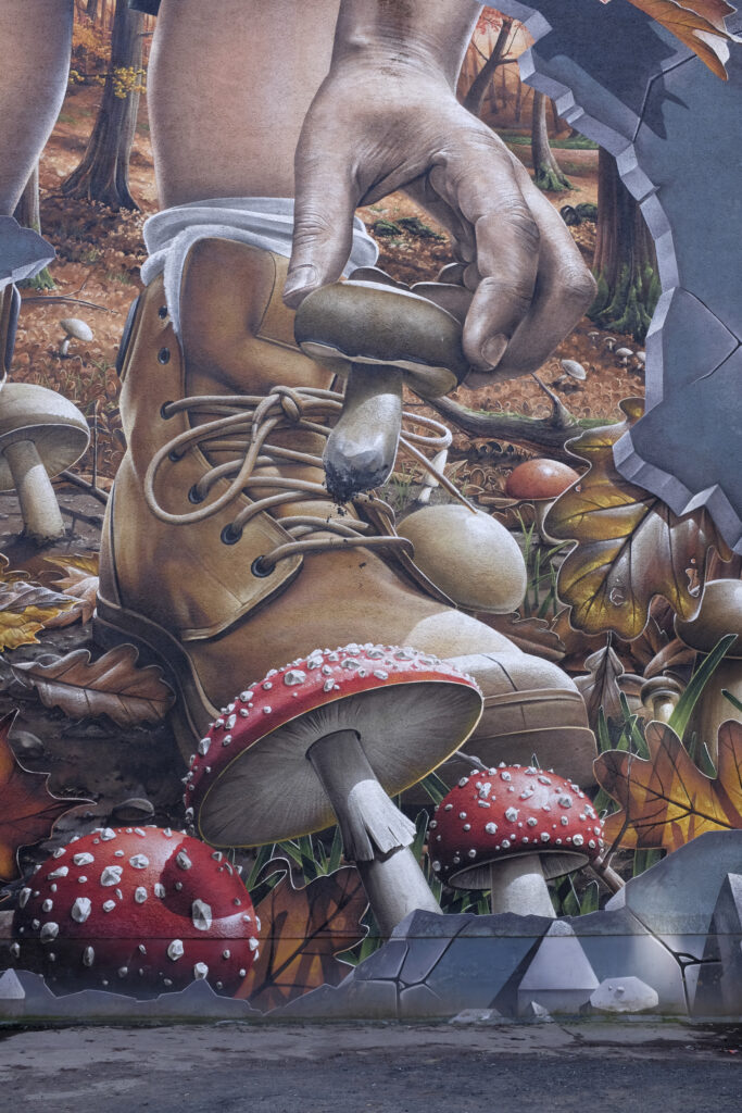 Scotland, Glasgow, Glasgow City. Glasgow City Centre Mural painted on a building by a car park - Part of a project designed to embrace the concept of street art to promote the city centre, reduce the negative visual impact of land and unit vacancies due to the current economic circumstances, and provide features that will attract more visitors.