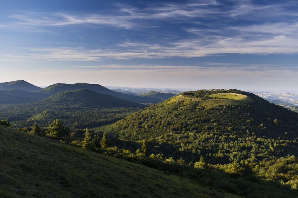 France, Auvergne, Regional Nature Park of the Volcanoes of Auvergne. An elevated view of the Chaîne des Puys viewed from near the summit of Puy de Pariou.
