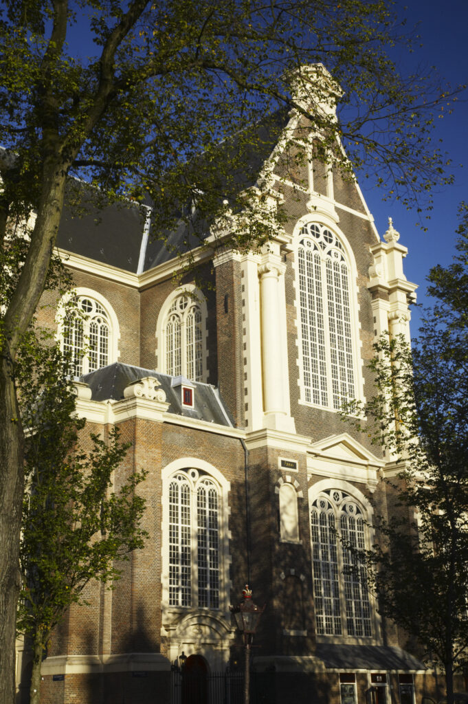 Netherlands, North Holland, Amsterdam. Morning light accentuates the impressive architecture of the Westerkerk buiding in Amsterdam City.