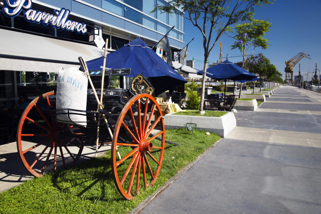 Argentina, Buenos Aires Province, Buenos Aires. Horse wagon with Mate sack, outside a cafe / restaurant on the dock side of Puerto Madero.