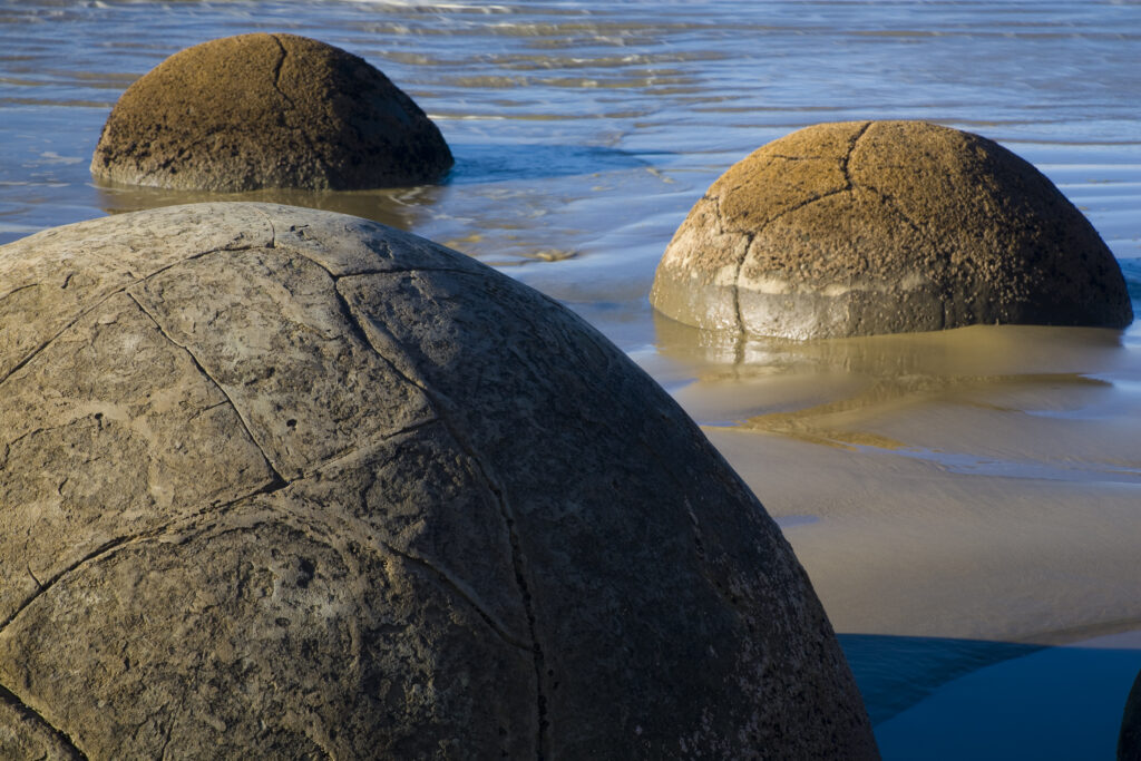New Zealand, Otago, Moeraki Boulders. The famous spherical Moeraki boulders on the North Otago coast.