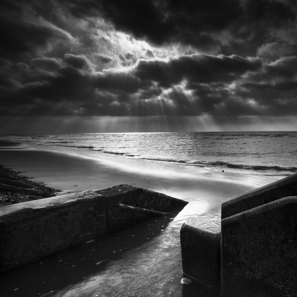 England, Lancashire, Blackpool. Dramaic light above the Irish Sea along the South Shore at Blackpool.