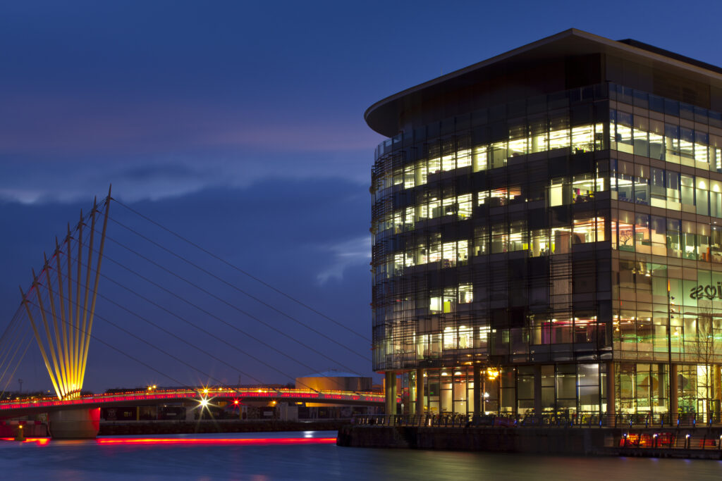England, Greater Manchester, Salford Quays. Swing Bridge and Media City UK buildings located on the Salford Quays in the city of Salford near Manchester Old Trafford.