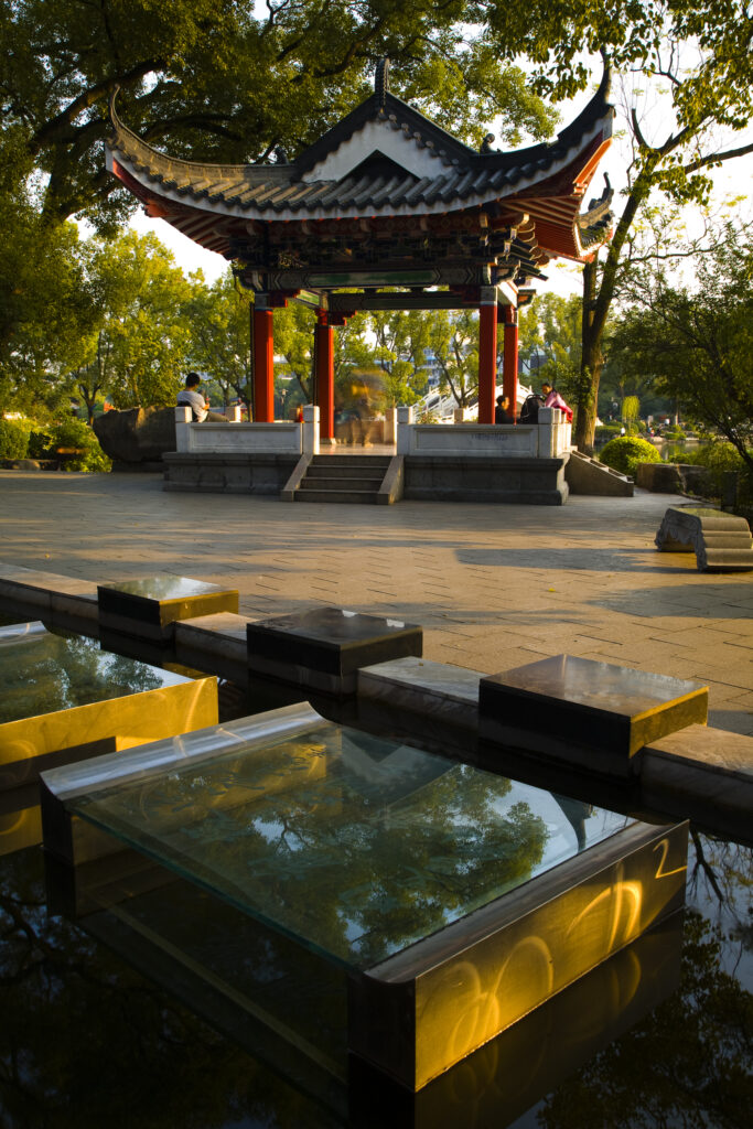 China, Guangxi Zhuang Autonomous Region, Guilin City. Water feature in front of a pagoda in Guilin City.