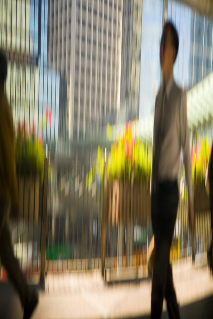 People's Republic of China, Hong Kong Special Administrative Region, Hong Kong Island. Abstract view of office worker and business men walking among the financial district of Hong Kong.