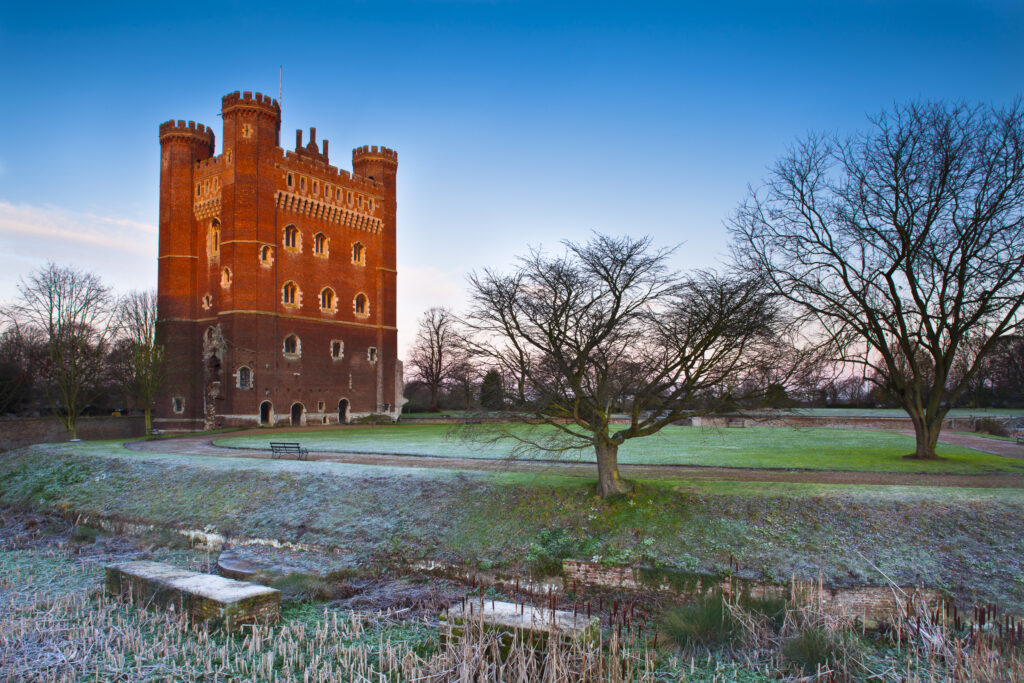 England, Lincolnshire, Tattershall Castle. Tattershall Castle, a red-brick medieval castle built by Ralph Cromwell, Lord Treasurer of England in 1434, on a frosty winters morning.