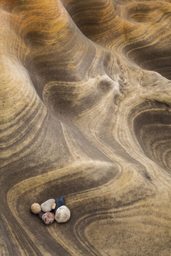 England, North Yorkshire, Scarborough. Wave sculptured rocks on the coast near Scarborough in the North York Moors National Park.