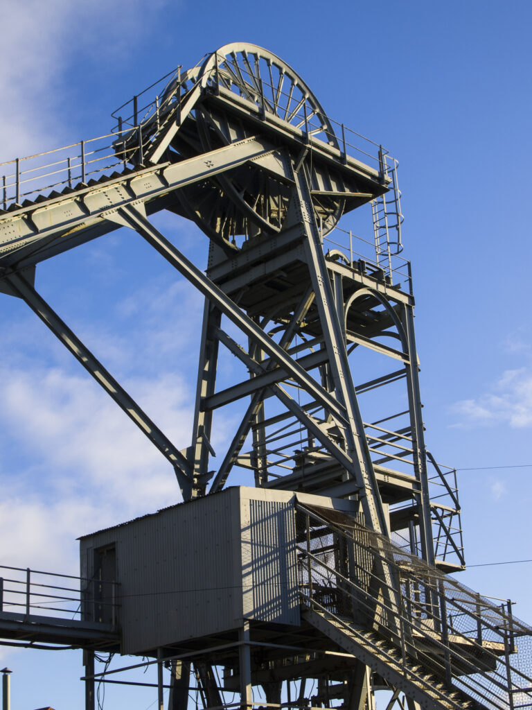 England, Northumberland, Woodhorn Colliery Mining Museum. Pit Head Winding Gear at the Woodhorn Colliery Mining Museum near Ashington - Once a former coal pit.