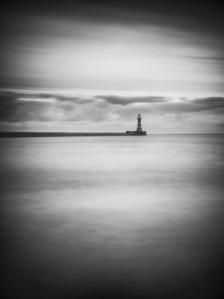 England, Tyne and Wear, Roker Pier. Roker Pier and Lighthouse located at the mouth of the River Wear in the city of Sunderland.