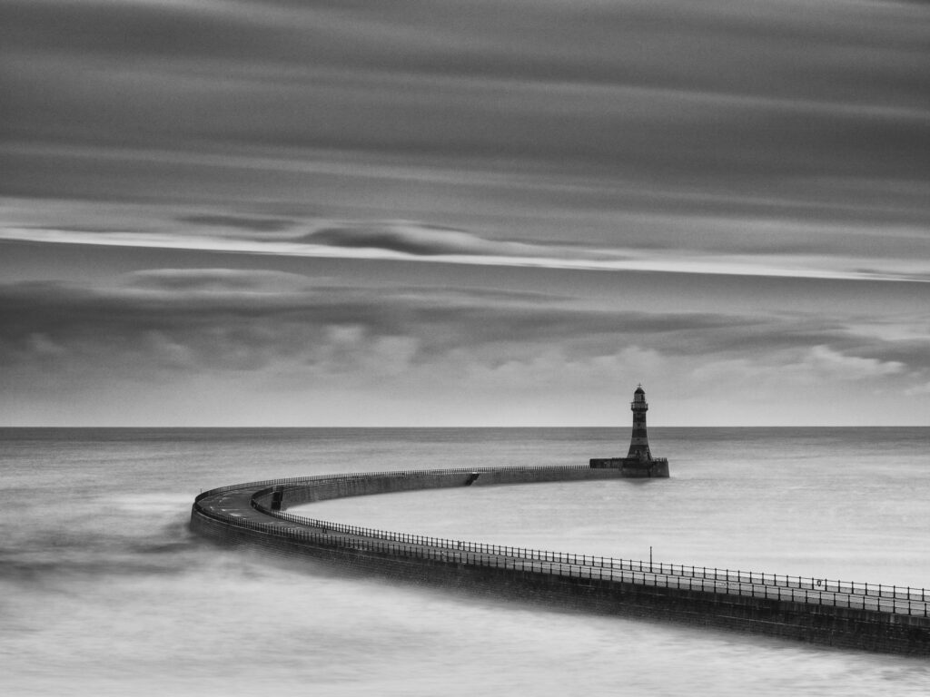 England, Tyne and Wear, Roker Pier. Roker Pier and Lighthouse located at the mouth of the River Wear in the city of Sunderland.