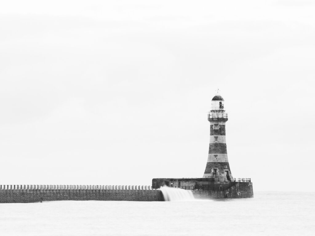 England, Tyne and Wear, Roker Pier. Roker Pier and Lighthouse located at the mouth of the River Wear in the city of Sunderland.