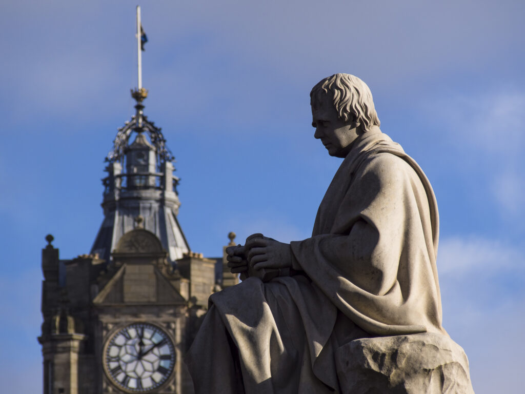 Scotland, Edinburgh, Princes Street Gradens. Monument to Sir Walter Scott known simply as 'Scotts Monument' located along the busy Princes Street.
