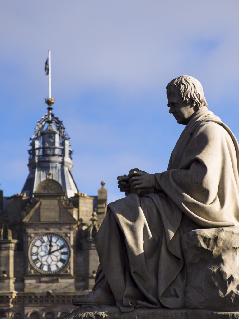 Scotland, Edinburgh, Princes Street Gradens. Monument to Sir Walter Scott known simply as 'Scotts Monument' located along the busy Princes Street.