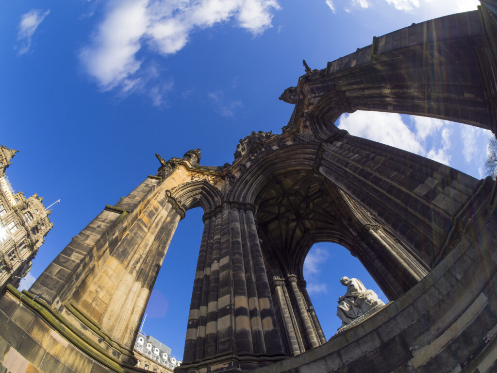 Scotland, Edinburgh, Princes Street Gradens. Monument to Sir Walter Scott known simply as 'Scotts Monument' located along the busy Princes Street.
