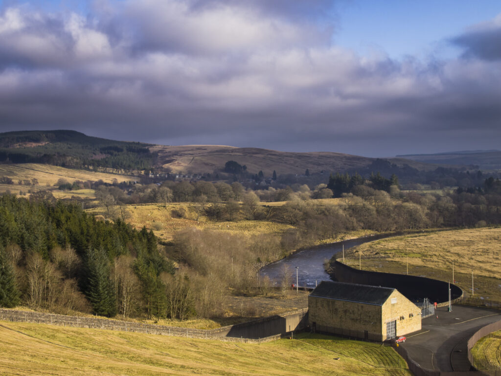 England, Northumberland, Kielder Water & Forest Park. Looking south from the Kielder Water Dam (the largest artificial lake in the UK by capacity) towards the rolling hills of Northumberland.