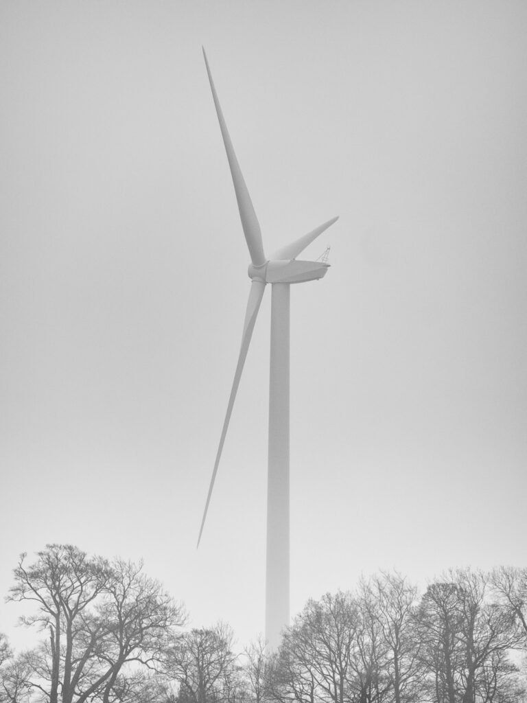 England, Northumberland, Plessey Woods Country Park. Wind Turbine on a foggy day, located alongside the Plessey Woods Country Park.