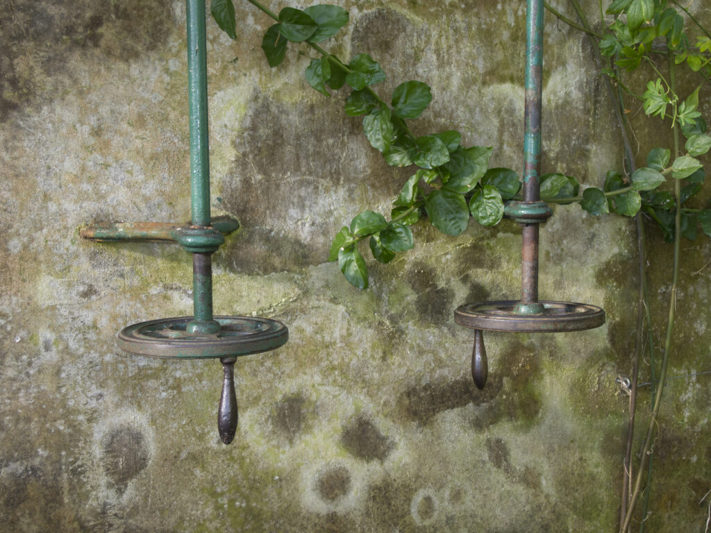 England, Northumberland, Wallington Estate. Ornate handles for greenhouse windows in the walled garedn of the Wallington Hall Estate (National Trust) in Northumberland, UK.