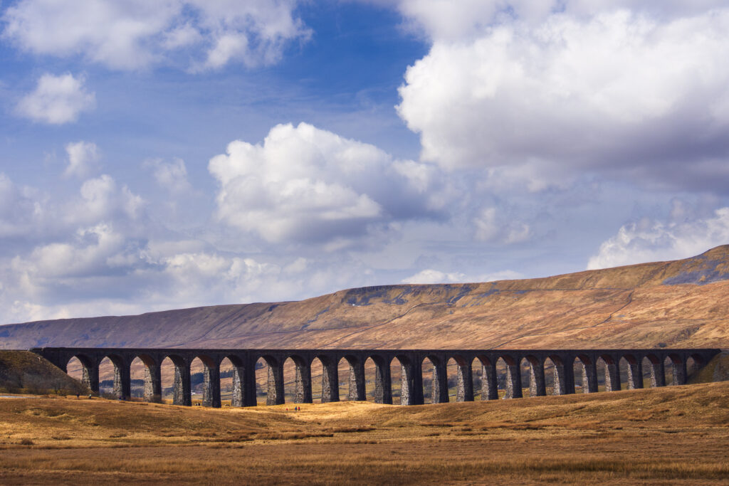 England, North Yorkshire, Yorkshire Dales National Park. Ribblehead Viaduct, a railway viaduct across the valley of the River Ribble at Ribblehead in the Yorkshire Dales.