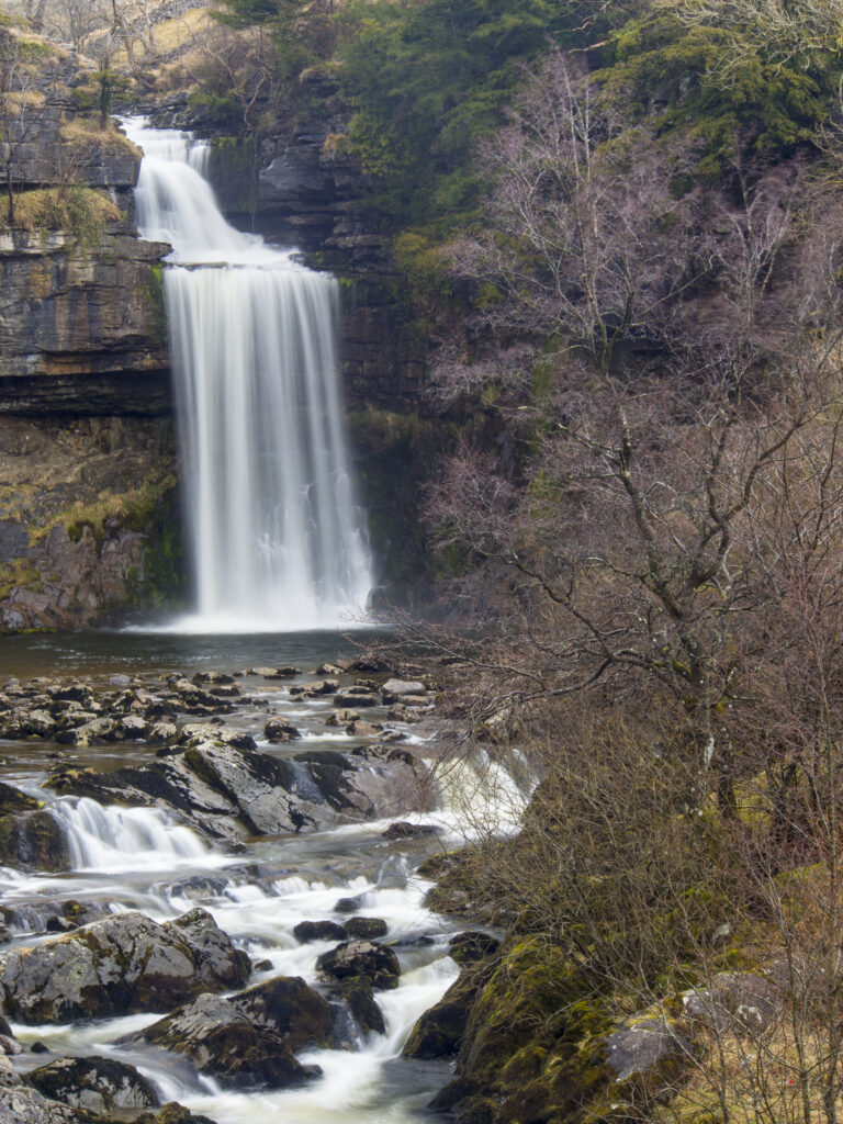 England, North Yorkshire, Yorkshire Dales National Park. The fast flowing waters of the Thornton Force waterfall, near Ingleton.