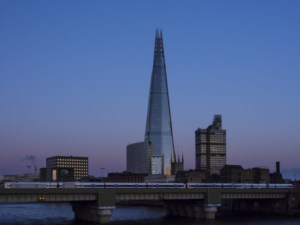 England, London, London Bridge Quater. The Shard, also referred to as the Shard of Glass, Shard London Bridge and formerly London Bridge Tower, is a 72-storey skyscraper in London and is the tallest building in the European Union.