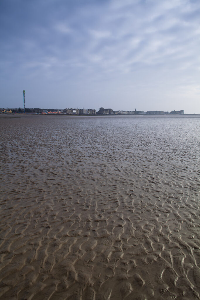 England, Lancashire, Morecambe. Low tide at the seaside resort of Morecambe located on Morecambe Bay.