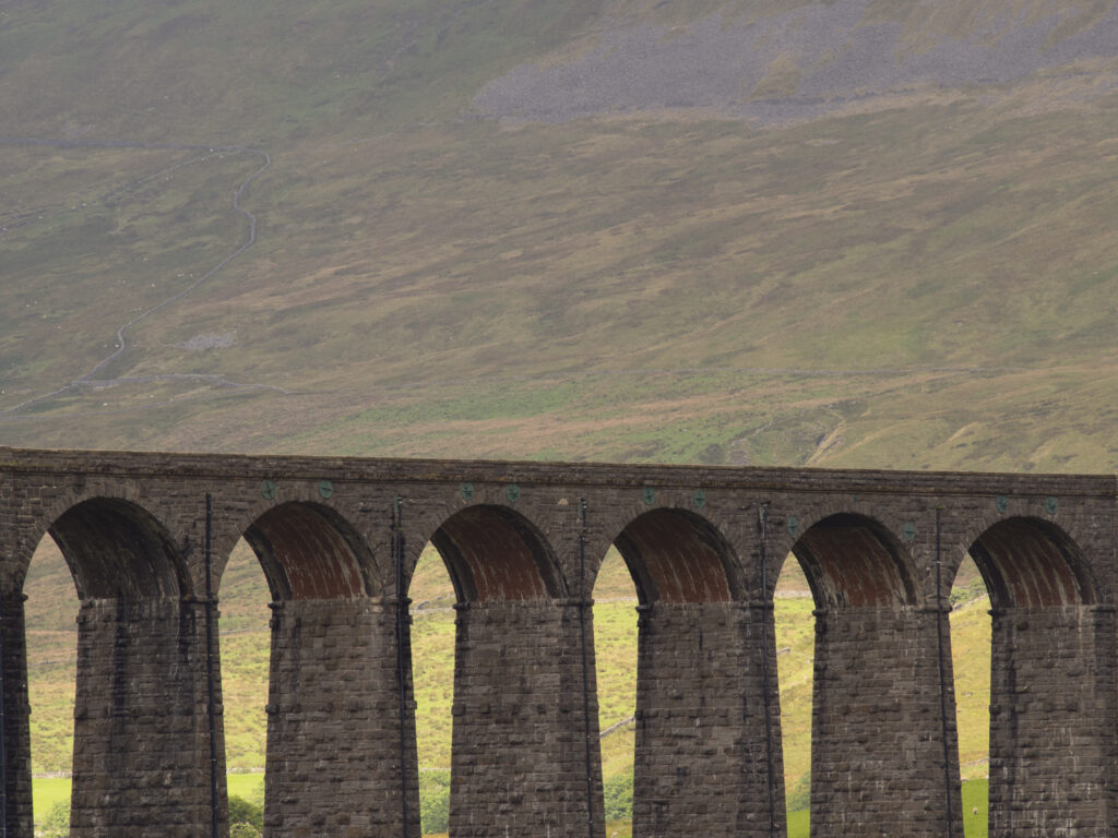 England, North Yorkshire, Yorkshire Dales National Park. Ribblehead Viaduct, a railway viaduct across the valley of the River Ribble at Ribblehead in the Yorkshire Dales.