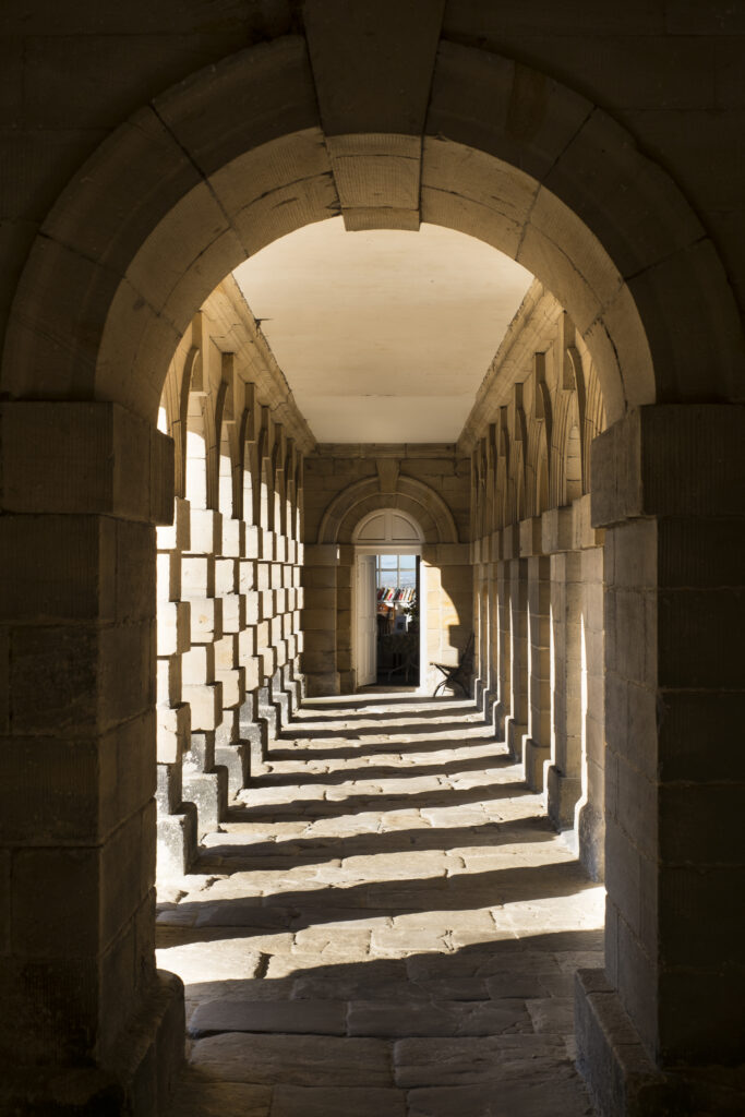 England, Northumberland, Seaton Delaval Hall. Stone archway at Seaton Delaval Hall, considered to be Sir John Vanburgh's final masterpiece.