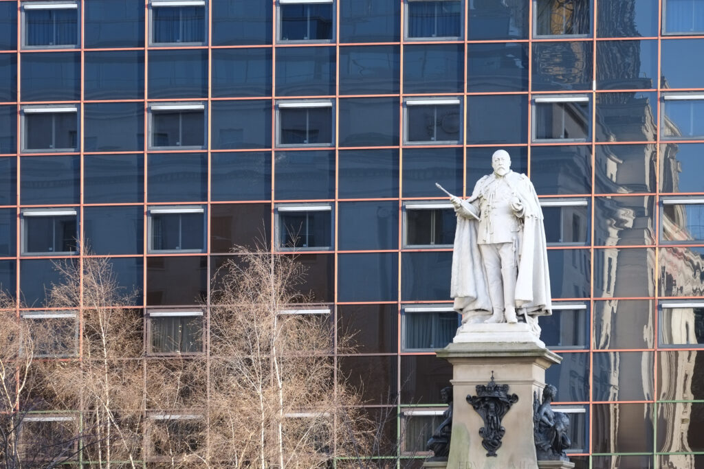 England, West Midlands, Birmingham City. Baskerville House in Centenary Square, reflected upon the modern facade of the Copthorne Hotel.