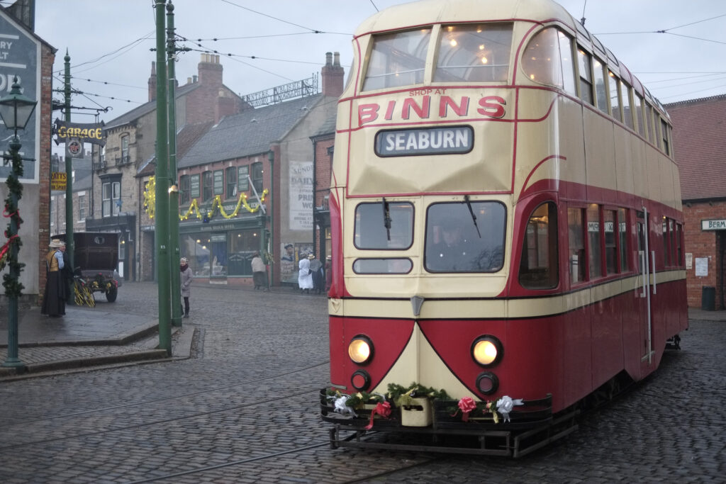 England, Tyne & Wear, Beamish Museum. Christmas decoraions on a tram at the Beamish Museum, a world famous museum telling the story of the people of North East England during the Georgian, Victorian, and Edwardian periods.