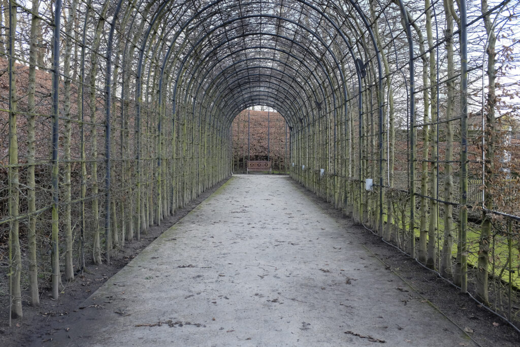 England, Northumberland, Alnwick Gardens. Wooden archway at the Alnwick Gardens near Alnwick Castle.