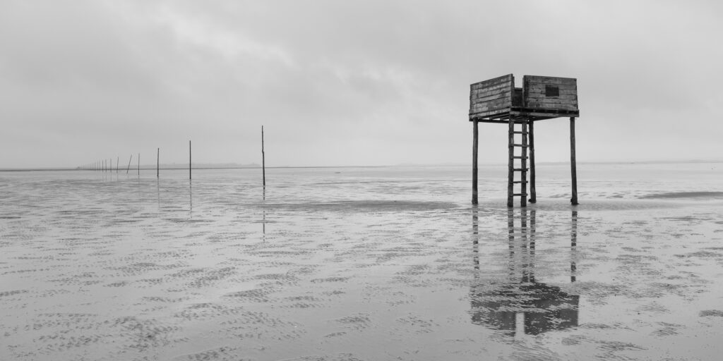 England, Northumberland, Northumberland Heritage Coast. Emergency shelter on the Pilgrim's Causeway linking the Holy Island of Lindisfarne off the Northumberland Coast with the mainland.