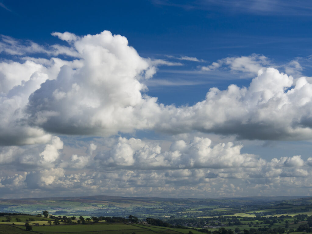 England, North Yorkshire, Yorkshire Dales National Park. Clouds above the Yorkshire Dales viewed from near Malham Cove in the Yorkshire Dales National Park.