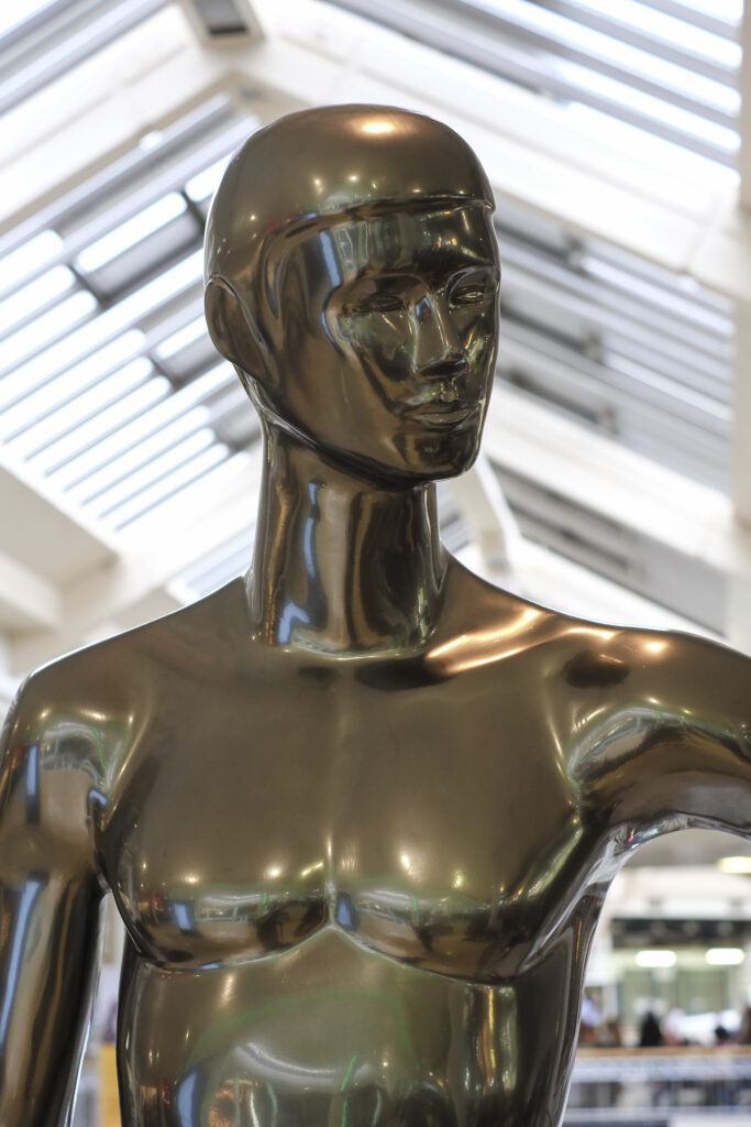 England, Tyne and Wear, Newcastle Metocentre. Bronze statue in the upper shoppping mall of the Newcastle Metrocentre.