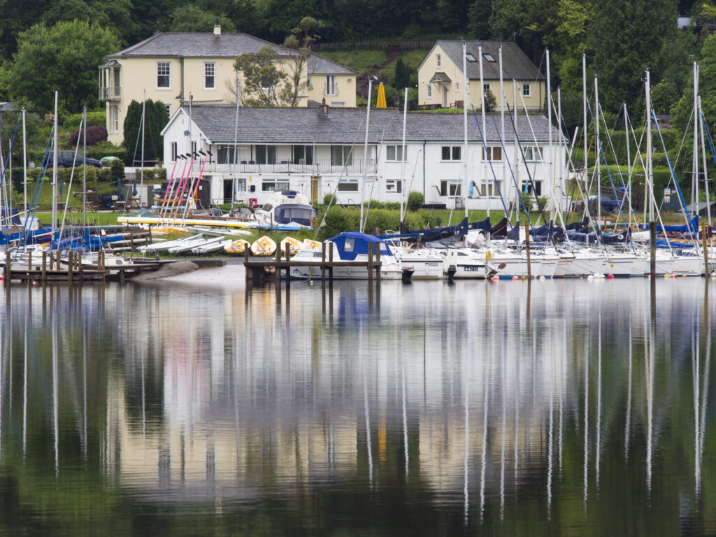 England, Cumbria, Lake District National Park. Boats moored on Derwentwater at Derwent Water Marina near Portinscale.