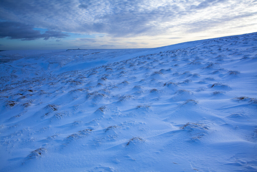 England, Northumberland, Northumberland National Park. The snow covered Cheviot Hills near the Scottish Border and Carter Bar in the Redesdale area of the National Park.