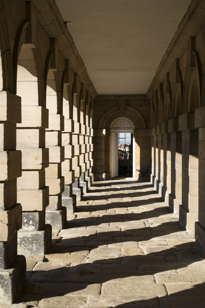England, Northumberland, Seaton Delaval Hall. Stone archway at Seaton Delaval Hall, considered to be Sir John Vanburgh's final masterpiece.