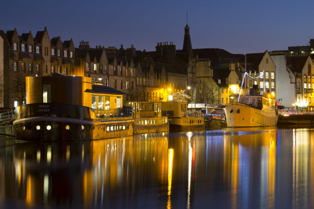 Scotland, Edinburgh, Leith. A barge (now a floating restaurant) moored on 'The Shore' in Leith, a suburb of the city of edinburgh.