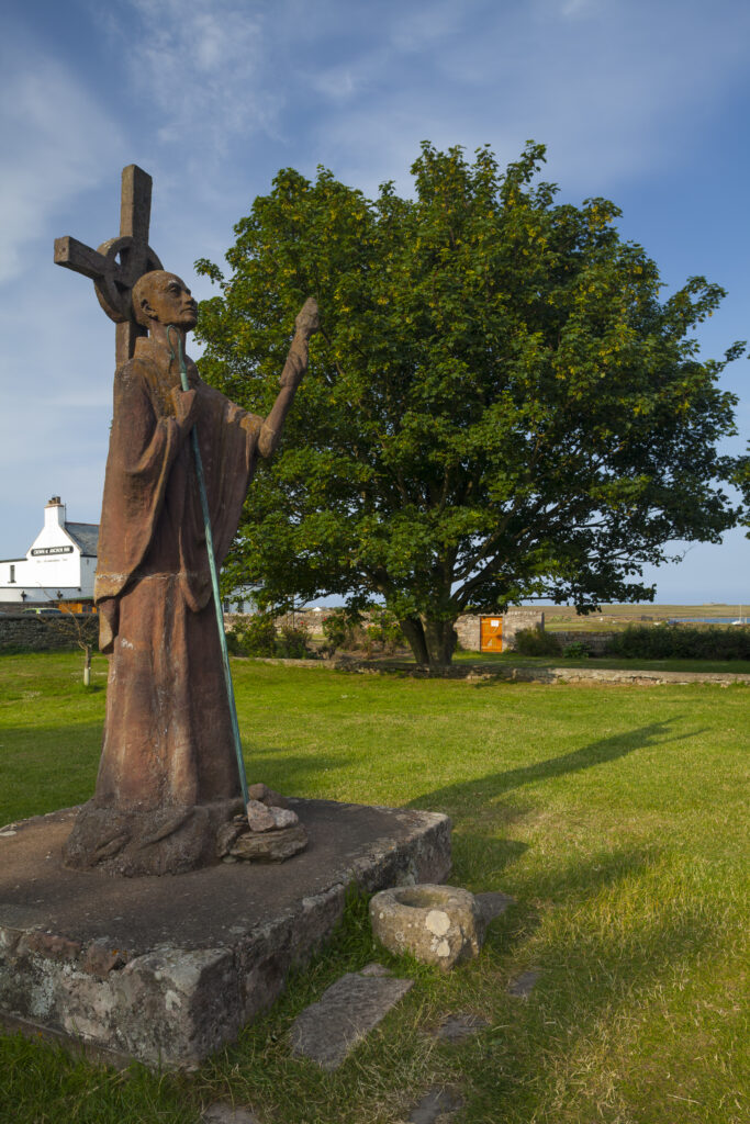 England, Northumberland, Lindisfarne / Holy Island. Statue of St. Aidan in the grounds of the Lindisfarne Priory.