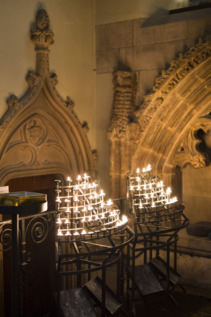 Scotland, Edinburgh, St Giles' Cathedral. Lit candles in the interior of High Kirk of Edinburgh (St Giles' Cathedral), located on the Royal Mile.