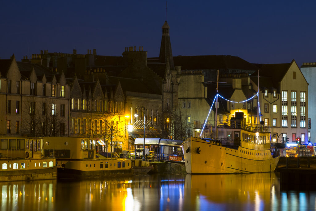Scotland, Edinburgh, Leith. A barge (now a floating restaurant) moored on 'The Shore' in Leith, a suburb of the city of edinburgh.